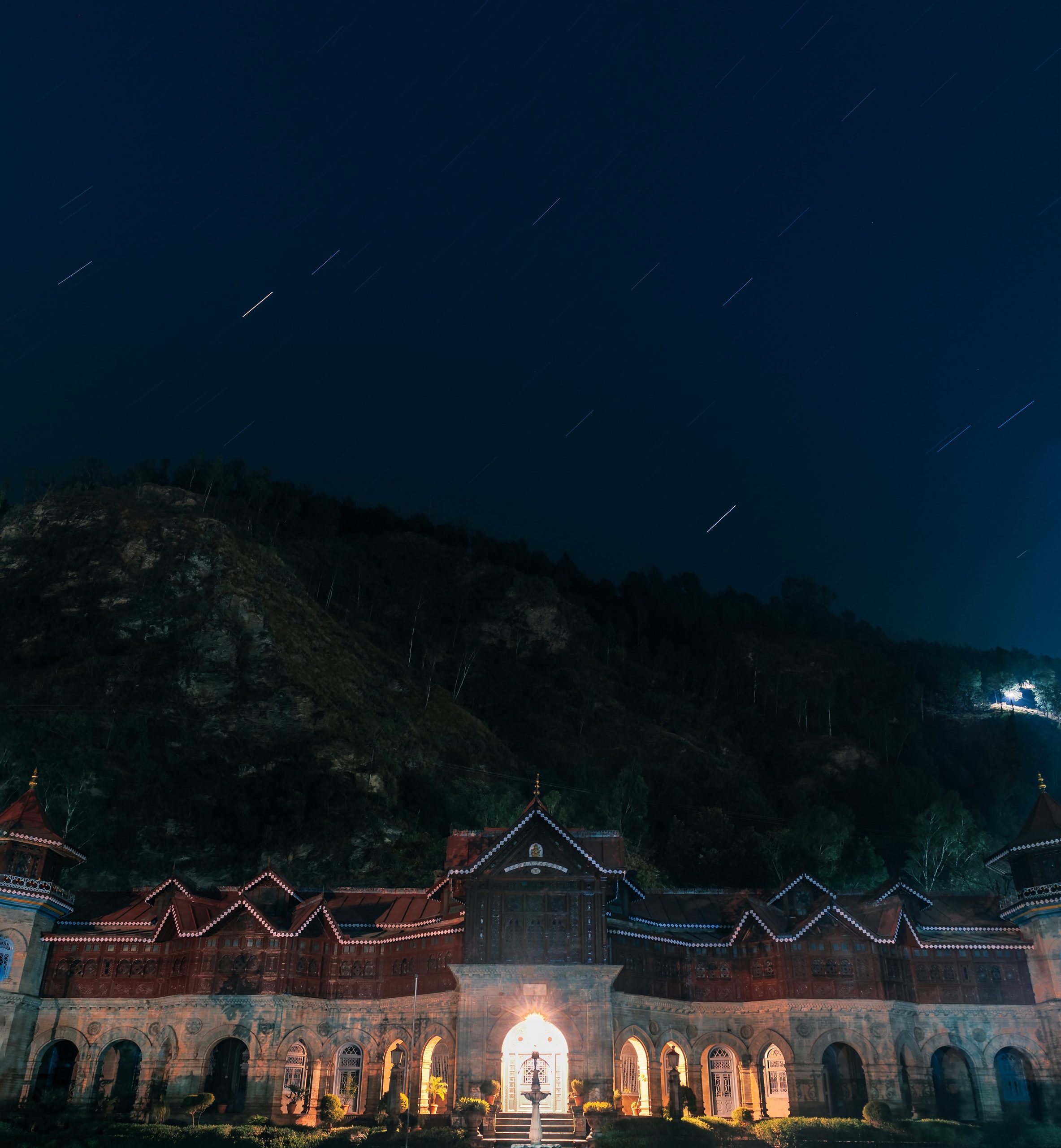 Lit palace architecture photographed at night